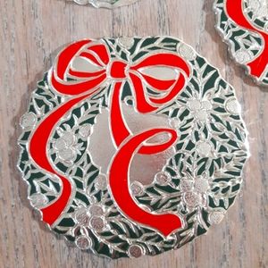 Silver plated retro holiday wreath coasters with bows and holly